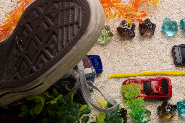 A showcase of various sustainable sneakers made from recycled materials, highlighting unique textures such as recycled ocean plastic, plant-based dyes, and innovative eco-friendly designs. The image aims to promote eco-consciousness in sneaker fashion.