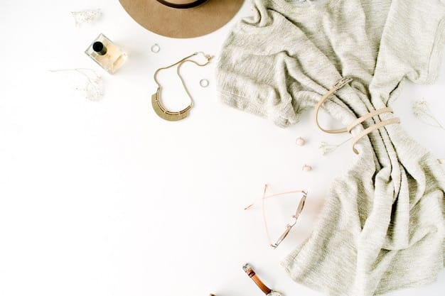A flat lay arrangement showcasing essential casual wardrobe items, including a white t-shirt, a pair of blue jeans, a gray sweater, white sneakers, and a denim jacket, all neatly organized on a light-colored surface.