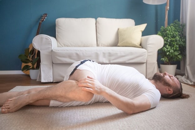 A person lying comfortably on their back with one hand on their chest and the other on their abdomen, demonstrating the proper hand placement for diaphragmatic breathing. The image should convey a sense of relaxation and ease, with soft lighting and a neutral background.
