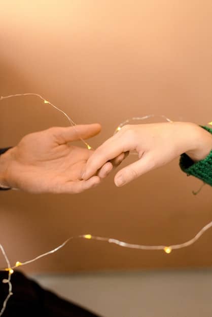 Close-up of two hands gently touching during a conversation. The focus is on the connection and attentiveness conveyed through the subtle gesture, symbolizing the intimacy fostered by mindful listening.