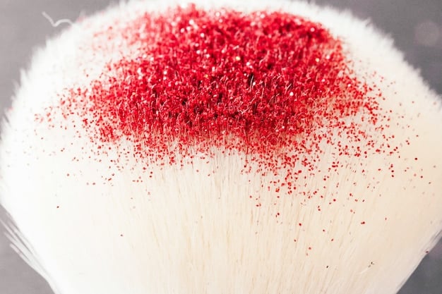 A detailed shot of various makeup brushes being cleaned under running water, with water droplets glistening on the synthetic bristles, illustrating the importance of brush hygiene.