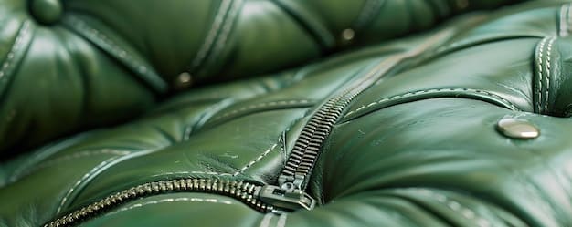 A close-up of a stylish, affordable puffer jacket in a deep forest green, with visible quilted pattern and a soft, matte finish. The fabric looks durable and the zipper details suggest good quality.