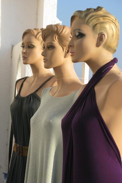 A bustling modern storefront featuring mannequins of various body sizes showcasing the newly expanded plus-size line, with shoppers browsing excitedly.