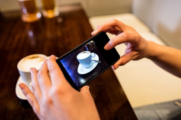 A person using an augmented reality app on their phone, which shows a digital jacket superimposed perfectly onto their body in real-time, in a modern cafe setting.