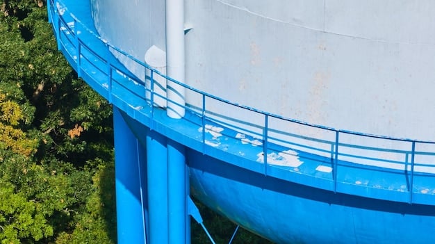 A close-up of a water treatment facility with large tanks and pipes, demonstrating advanced filtration systems for工业 wastewater, clean water flowing in the foreground.