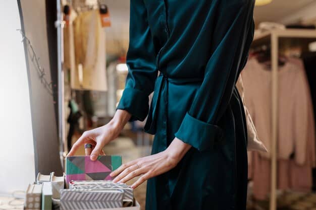 A detailed shot of stylists meticulously arranging haute couture garments and accessories on racks backstage, prior to a major fashion magazine photoshoot. Vibrant colors and luxurious fabrics are visible.