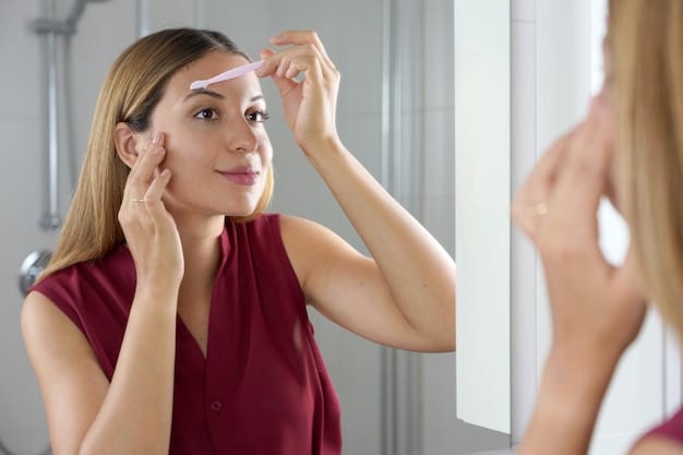 A woman applying tape to the outer corner of her eye to create a guide for winged eyeliner. The tape is placed at an angle, creating a sharp line. This is a clear demonstration of how to use the tape guide method for The Ultimate Guide to Winged Eyeliner: 3 Methods for Achieving Perfect Wings Every Time.