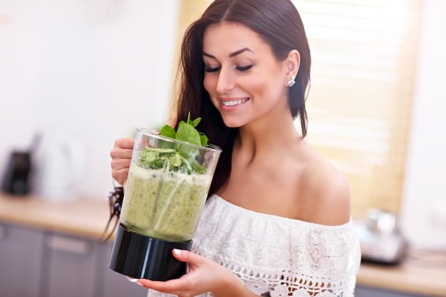 A close-up shot of a woman smiling while preparing a green smoothie. She is adding fresh spinach leaves to a blender filled with other green ingredients, symbolizing the healthy and vibrant nature of a detox diet. Her hands are visible, showcasing the preparation process and implying a DIY approach to health and wellness, directly related to 'Reboot Your Diet: A 3-Day Detox Plan to Kickstart Healthy Habits'.