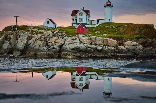 A scenic view of Peggy's Cove in Nova Scotia, Canada, featuring a historic lighthouse perched on rocky cliffs overlooking the Atlantic Ocean. The image captures the coastal charm of Nova Scotia, making it an ideal destination for Summer Travel: Top 3 Destinations for a Relaxing Getaway and Beat the Heat in 2025.