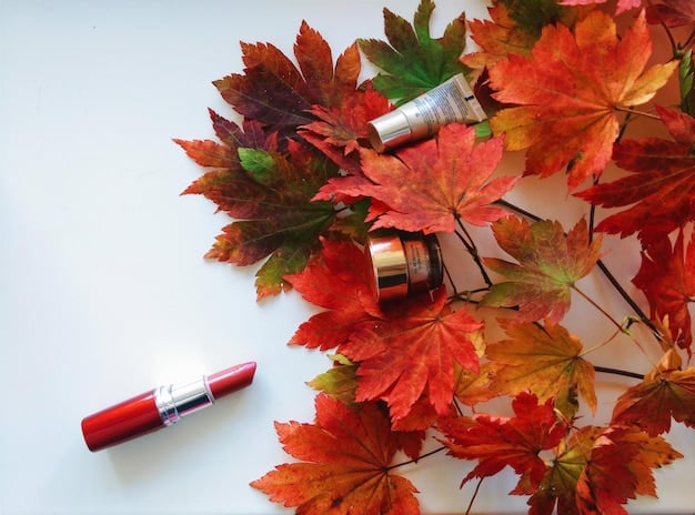 A close-up of various orange lipsticks arranged against a backdrop of vibrant autumn leaves. Different shades and finishes of orange lipstick are displayed, ranging from bright tangerine to muted terracotta. This visual showcases the Fall Beauty: 4 Bold Lipstick Shades to Make a Statement This Season focus on orange tones.