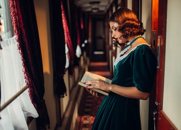 A person carefully examining a vintage dress in a thrift store, looking at the seams and fabric quality. The focus is on the details that distinguish authentic vintage from modern reproductions, showcasing 